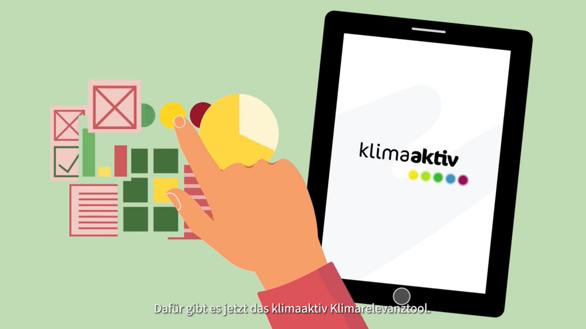Graphik eines Tablets mit dem Klimaaktiv Logo geöffnet links sieht man Graphiken und Symbole und eine Hand, die das Tablet bedient